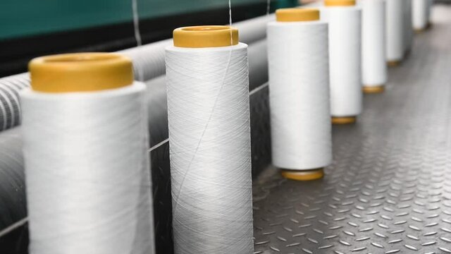 Yarn thread running in the machine