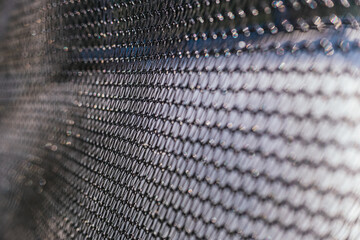 Close-up detail of the knots of a fine-mesh nylon mesh.