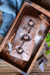 Chocolate gingerbread loaf cake with poached pears