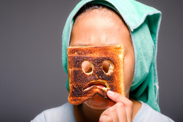 Girl with Burnt Toast and Sad Face Icon