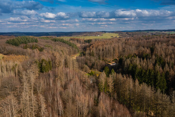 Aerial view over forests and meadows of Westerwald, Altenkirchen, Germany