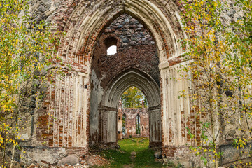 Fototapeta na wymiar The ruins of an old abandoned church. A large ruined old building of church.