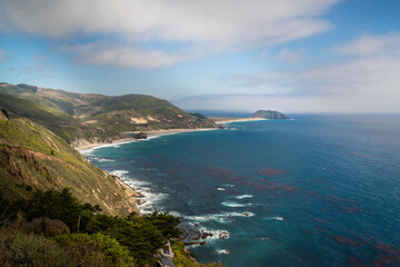 Fototapeta premium Ocean Hills and Mountains by Sandy Beach Cliffside Sea