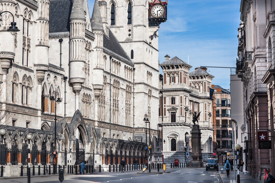 London, UK - February 23, 2021:  Royal Courts of Justice at Fleet Street.  Empty streets City of London during national lockdown. Covid restrictions, social distancing. 