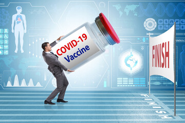 Businessman in covid-19 coronavirus vaccination concept