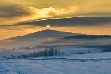 Sunrise over the Czech winter landscape, Czech Republic, Pilsen region