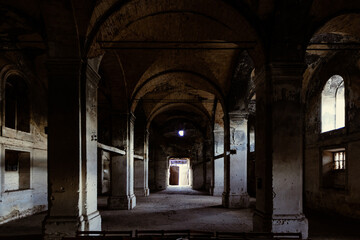 Fototapeta na wymiar Interior of dark creepy abandoned lutheran church of the Virgin Mary