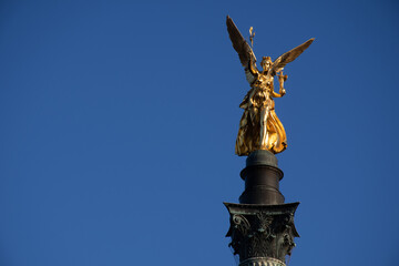 Fototapeta na wymiar The Friedensengel (Angel of Peace) monument, a Munich landmark built to commemorate the 25th anniversary of the peace agreement at the end of the Franco-German war of 1870-71