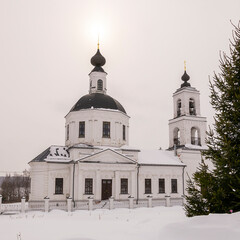 orthodox church made of white brick in winter