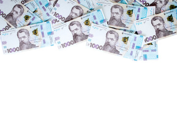 1000 Ukrainian hryvnias bills lies isolated on white background with copy space stacked in fan close up