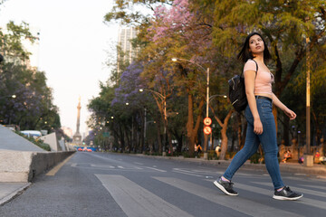 They study across the street in Mexico, with the Angel of Independence in the background