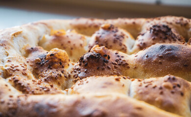 Turkish Ramadan Pita. Turkish Ramadan bread. Traditional Ramadan food as known Pide. Turkish bread with sesame and nigella seeds. Turkish Ramadan Pita. 