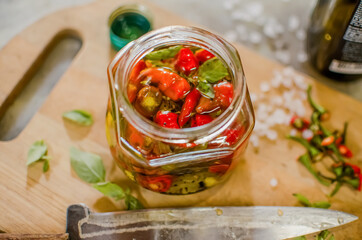 Pepper sauce on wooden board and many ingredients