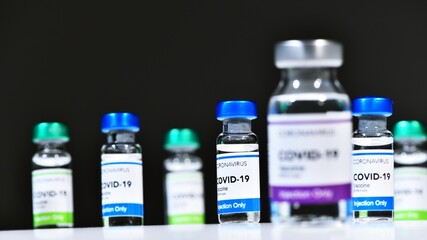 Vaccination treatment Covid-19 Coronavirus 2019 ncov virus. Numerous bottles in a research laboratory ready to be analyzed and compared before being put on sale