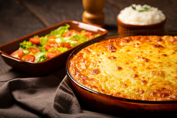 Shepherd's Pie (escondidinho) with salad and rice. Typical Brazilian food.