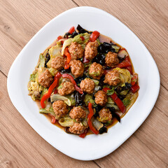 Original chinese dish - meat balls with various vegetables.