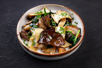 Vegan saute with mushrooms, aubergines and spinach