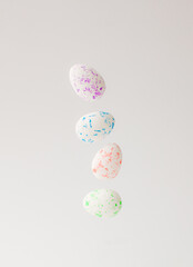 2021 Easter concept , falling white eggs with neon color decoration against white background. Creative Easter concept. Minimal arrangement.