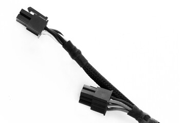 black wires on white isolated background close-up for power supply computer peripherals