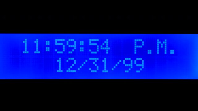 LED display of a clock turning over to the year 2000 with a Y2K malfunction as the clock glitches