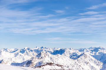 Panorama of the Caucasus mountains from Elbrus. Peaks of the sharp mountains from the highest mountain in the area. Mountains around Elbrus from a height of 4500 meters.
