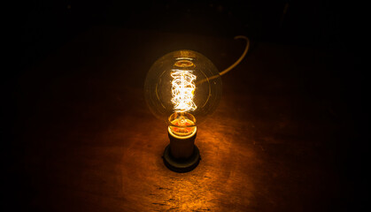 Beautiful retro luxury interior bulb lighting lamp decor glowing in dark.