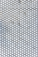 White geometric floor tile pattern