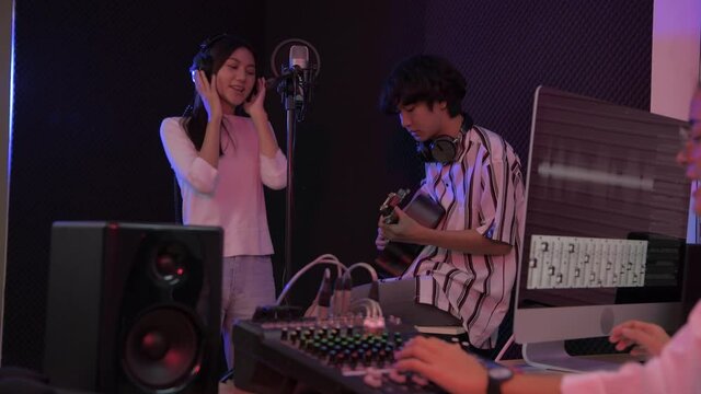 Audio recording concept of 4k Resolution. Artists are creating their music in the studio.