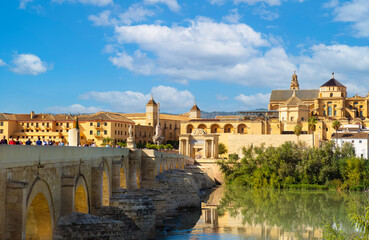 Roman Bridge in the heart of historic part of Cordoba with Mezquita Cathedral nearby