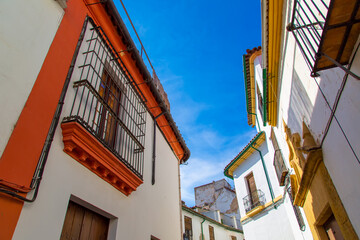 Fototapeta na wymiar Cordoba streets on a sunny day in historic city center near Mezquita Cathedral