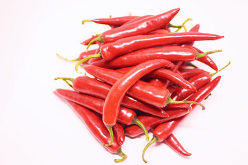 A pile of chili. White background.