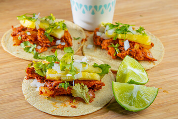 Mexican pork tacos al pastor close up macro