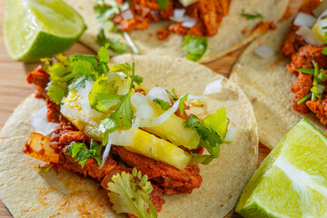 Mexican pork tacos al pastor close up macro