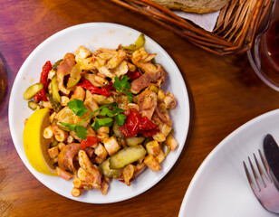 Delicious octopus salad with parsley and lemon. Turkish cuisine