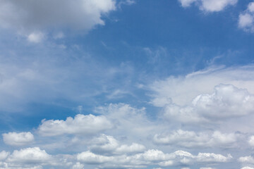 Naklejka na ściany i meble Bright blue sky with beautiful clouds. 