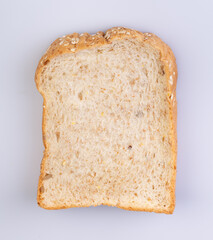 Whole wheat bread isolated on white background. Slice bread, made from 12 kinds of grains, clearly portray the texture and look delicious.