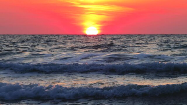 Colorful ocean beach sunrise, 4k video