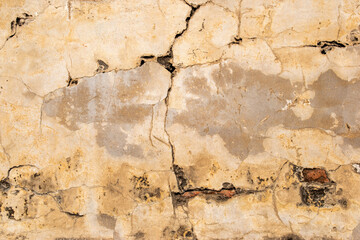 Cracked concrete wall. Texture of old broken wall.