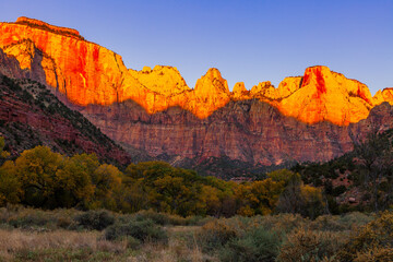 Morning light falls on the Towers of the Virgin in Utah's Zion National Park