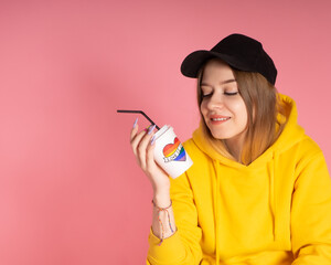 Woman with LGBT rainbow coffee cup