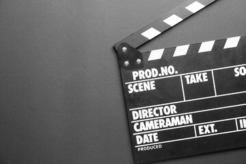 Cinema clapperboard on dark background