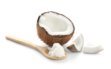 Spoon with coconut oil on white background