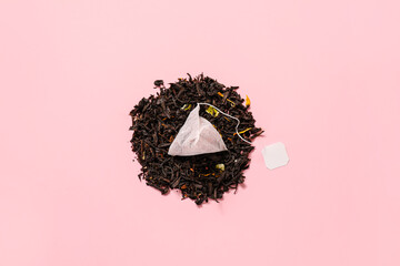 Composition with tea bag on color background