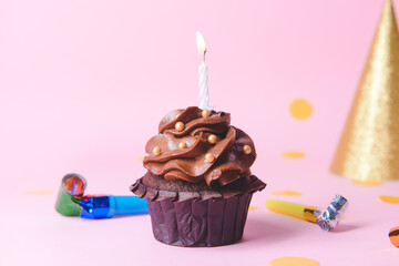 Composition with tasty chocolate cupcake on color background