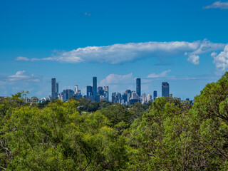 Fototapeta na wymiar Brisbane City Skyline on a Fine Day with Fluffy White Clouds