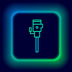 Glowing neon line Construction jackhammer icon isolated on black background. Colorful outline concept. Vector