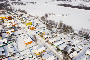 Top view over city Bronnitsy in winter day. View from above. Russia