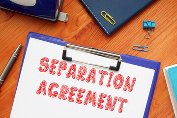  SEPARATION AGREEMENT inscription on the piece of paper.