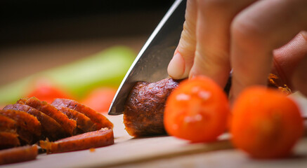 Delicious healthy breakfast with smoked sausage, pepper, tomato, serving in the kitchen