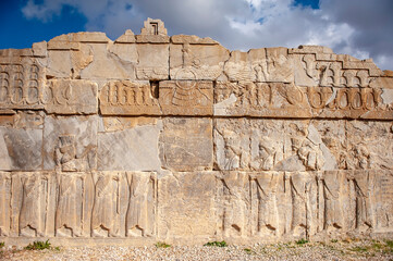 Beautiful Zoroastrian relief depicting Faravahar symbol at the ruins of Persepolis in Iran